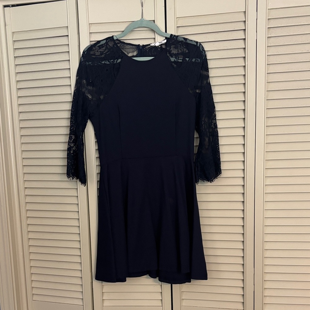 BB Dakota Navy Lace Detail Dress. I’d say it’s a junior large.